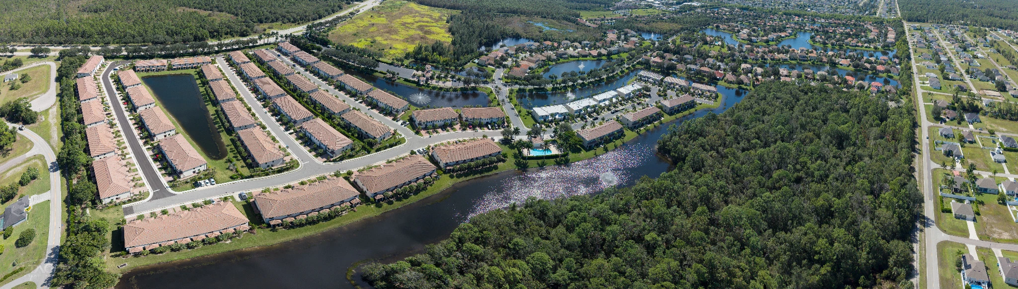 Stitched aerial panorama of the Coral Lakes residential community